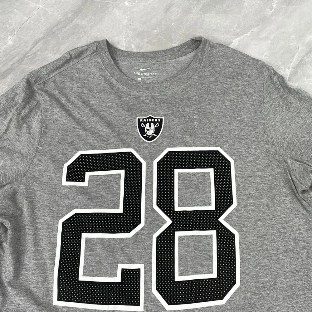 Men’s The Nike Tee Raiders Josh Jacobs #28 Short Sleeve Shirt XL